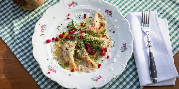 Un piatto di Schlutzkrapfen, ravioli tirolesi in segale